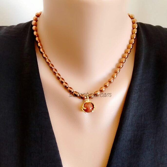 Hematite Necklace With Bronze Star Stone Charm Hematite Necklace With Bronze Star Stone Charm